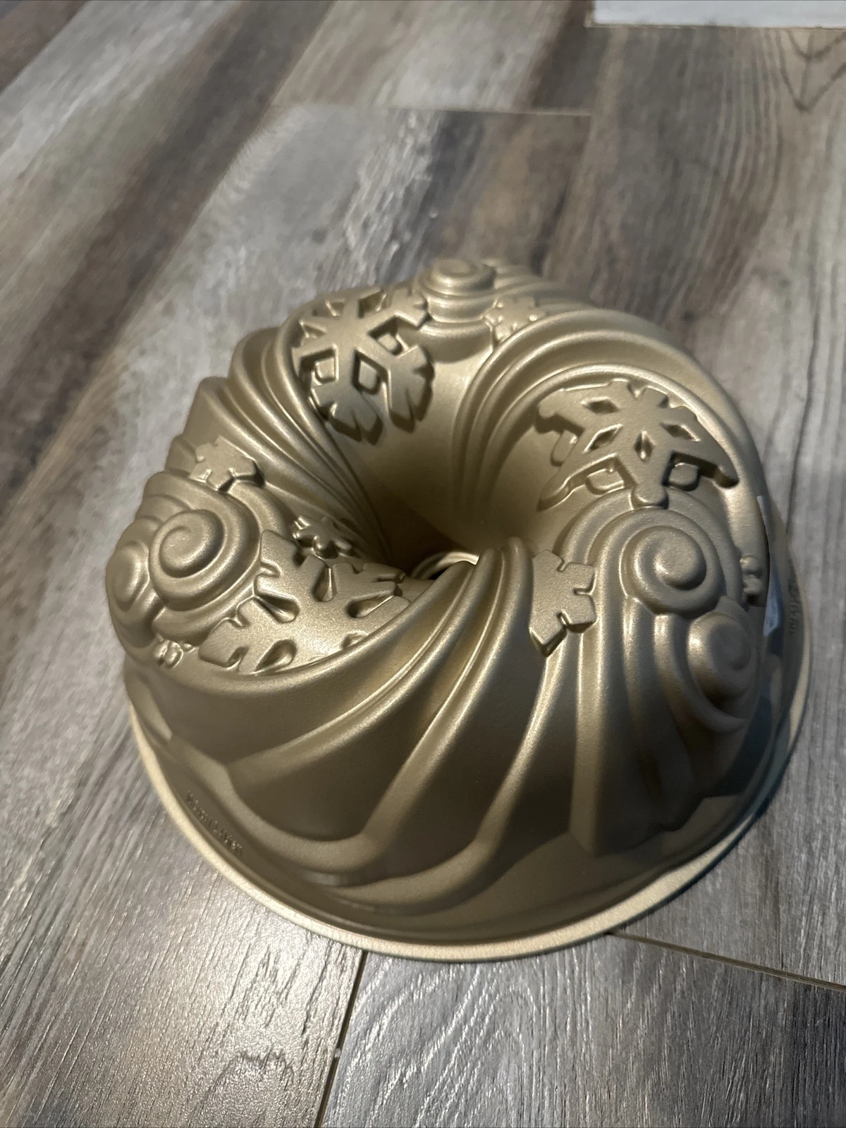 Nordic Ware Let It Snow Bundt Pan Gold Color