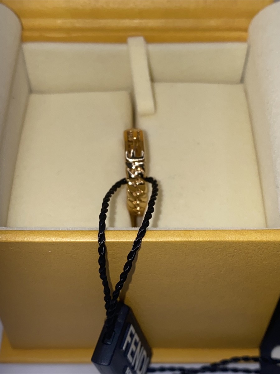 FENDI BAGUETTE RING IN GOLD COLOR RING. SIZE FENDI S / USA