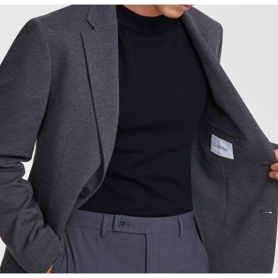 Abrigo deportivo cómodo informal ajustado tejido gris liso Calvin Klein para hombre talla 36S Foto 4 de 4