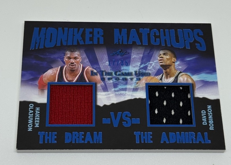 HAKEEM OLAJUWON DAVID ROBINSON MONIKER MATCHUPS GAME USED JERSEY CARD /35 LEAF