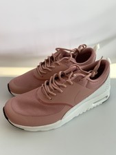 nike thea rust pink