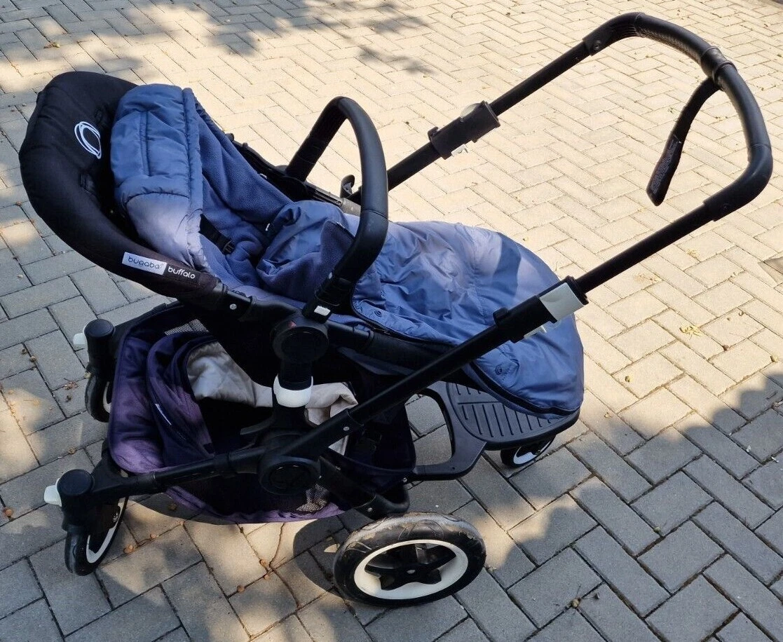 Pram top: Bugaboo Buffalo Navy with ride-on board in very good condition!