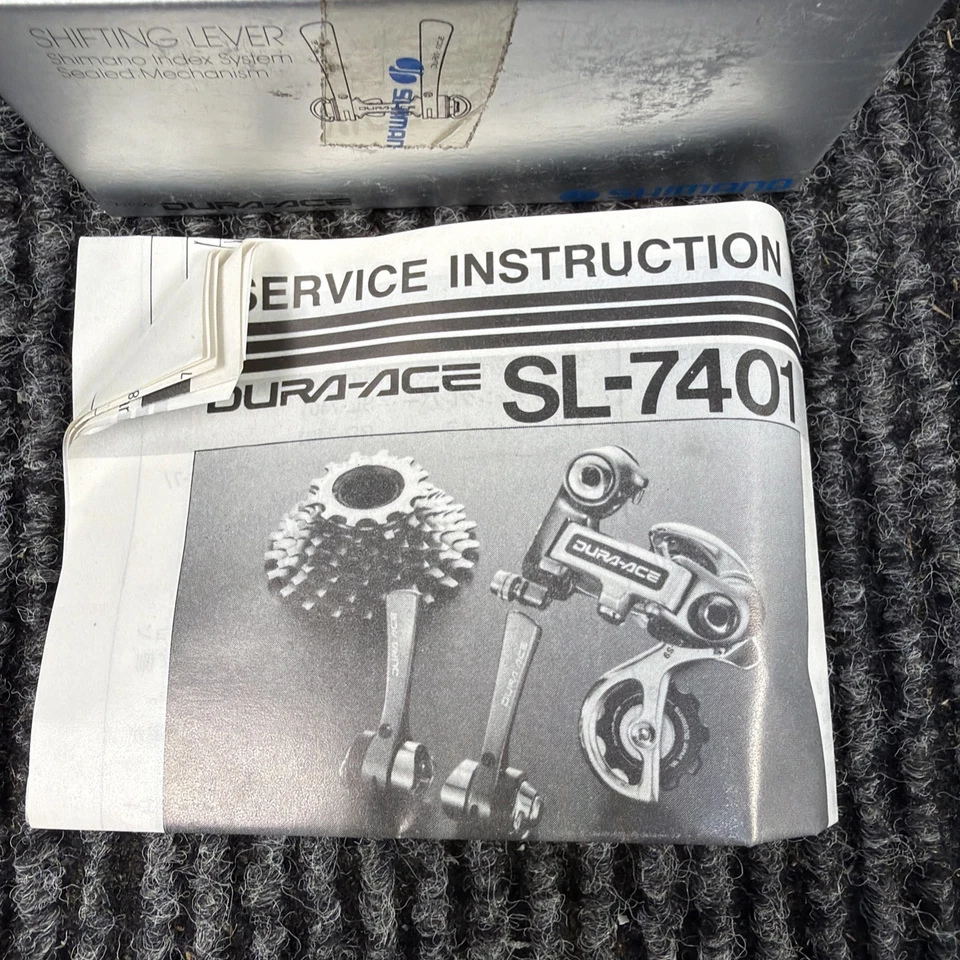 Nuevo en caja Cambios de tubo descendente Shimano Dura Ace SL-7401 índice de siete velocidades Foto 2 de 4