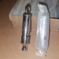 *UNUSED(STILL WRAPPED* METROPOLITAN WHISTLE"MADE INDIA" POLICE/FIRE/TRAIN ETC