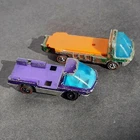 Hot Wheels Redline Lot 2x Heavyweights 1970-71 Dump Truck Purple Green Copper?