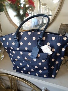 button spot smart nappy bag