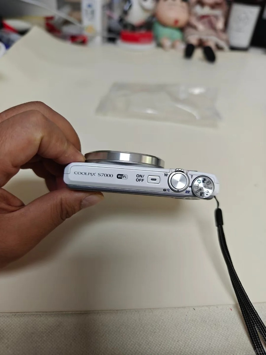 Nikon COOLPIX S7000 Digital Camera 16 MP 20x Optical Zoom English