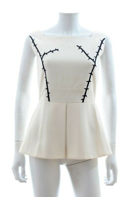 Top Con Orlo Peplum Ricamato / Crema | eBay