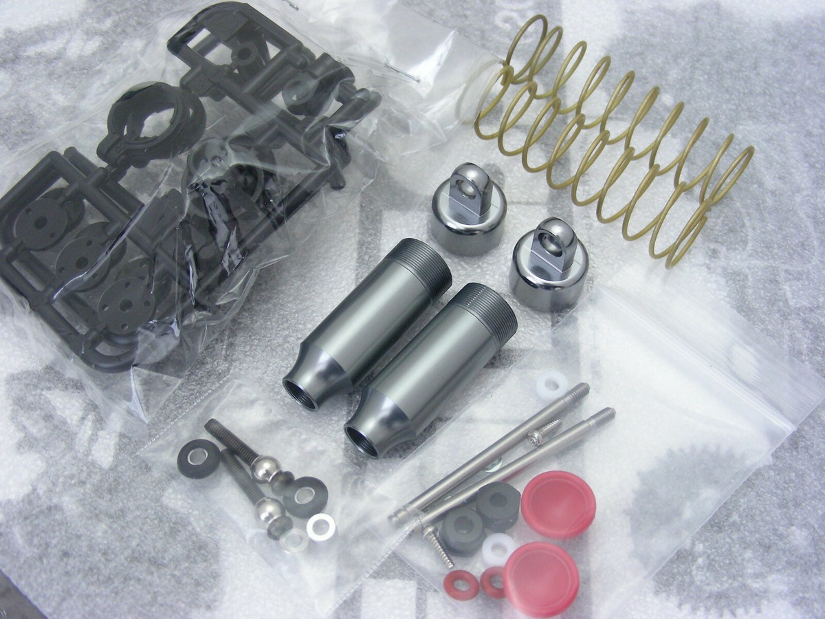 Amazon.com: Tamiya 54567-000 300054567 - DT-03 CVA Oil