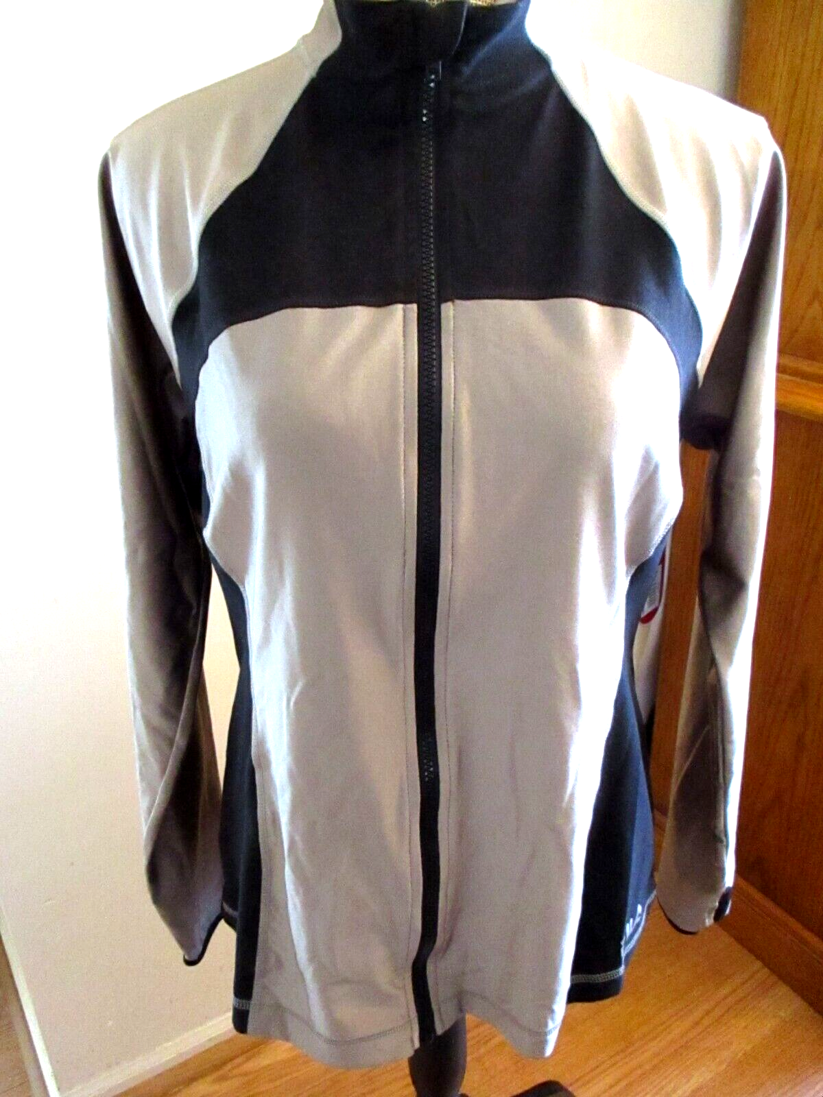 Giacca da corsa nuova con etichette Fila Sport 2 tonalità nero e marrone manica lunga fori per pollice taglia L