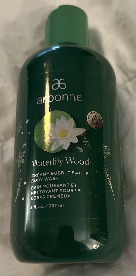 Jabón corporal y baño de burbujas cremosas fragancia madera nenúfar Arbonne 8 fl oz Foto 3 de 4