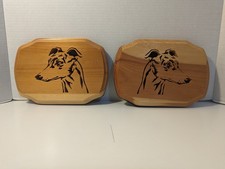 Two Matching Engraved Dog Head Wall Plaques.