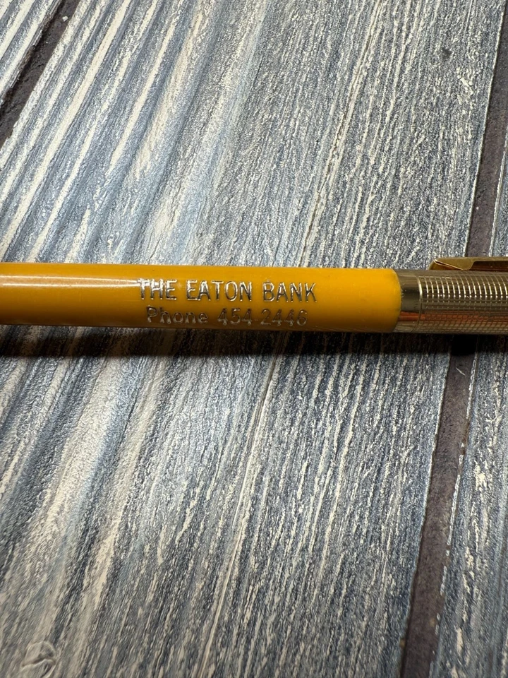 Bolígrafo amarillo vintage The Eaton Bank Colorado con detalles dorados Foto 2 de 4