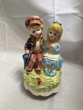 Vintage Artmark Girl And Boy Sitting on Bench with Umbrella Musical Figurine