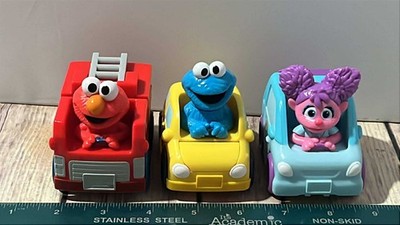 Sesame Street Twist Pop Wheelies Elmo Firetruck Abby Van Cookie Monster Taxi Lot