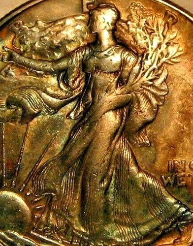 1941-D WALKING LIBERTY HALF DOLLAR TONED AND UNCIRCULATED