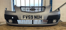 KIA RIO MK2 COMPLETE FRONT BUMPER ASSEMBLY PANEL FOG LIGHTS IN SILVER 2005-2010