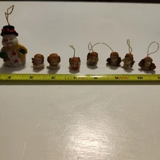 Small Angel Head Christmas Ornaments And A Snowman Ornament 