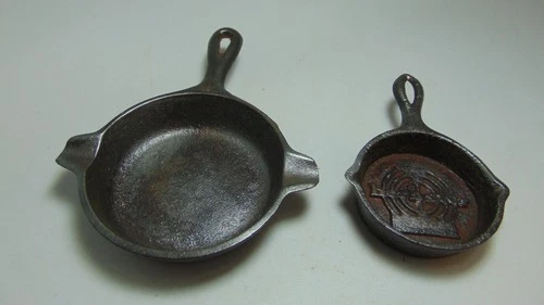 2 Vintage Cast Iron Skillet Ashtrays -- Wagner & Herbster