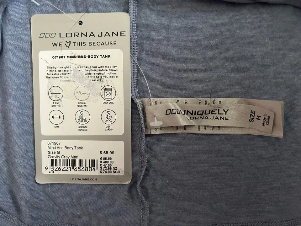 Camiseta sin mangas Lorna Jane mente y cuerpo talla mediana gris gravedad espalda deportiva Foto 3 de 3