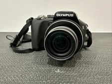Olympus SP-560UZ 8MP Digital Cam W/Dual Image Stabilised Black