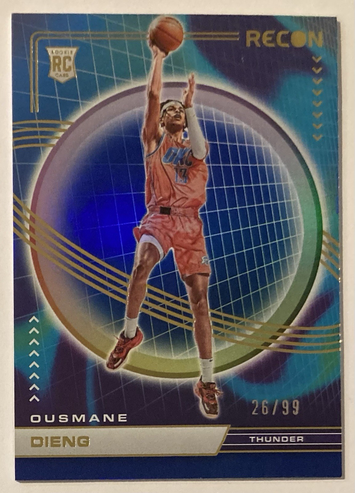 2022-23 Panini Recon - Rookies Ousmane Dieng #225 Holo Blue /99 (RC)