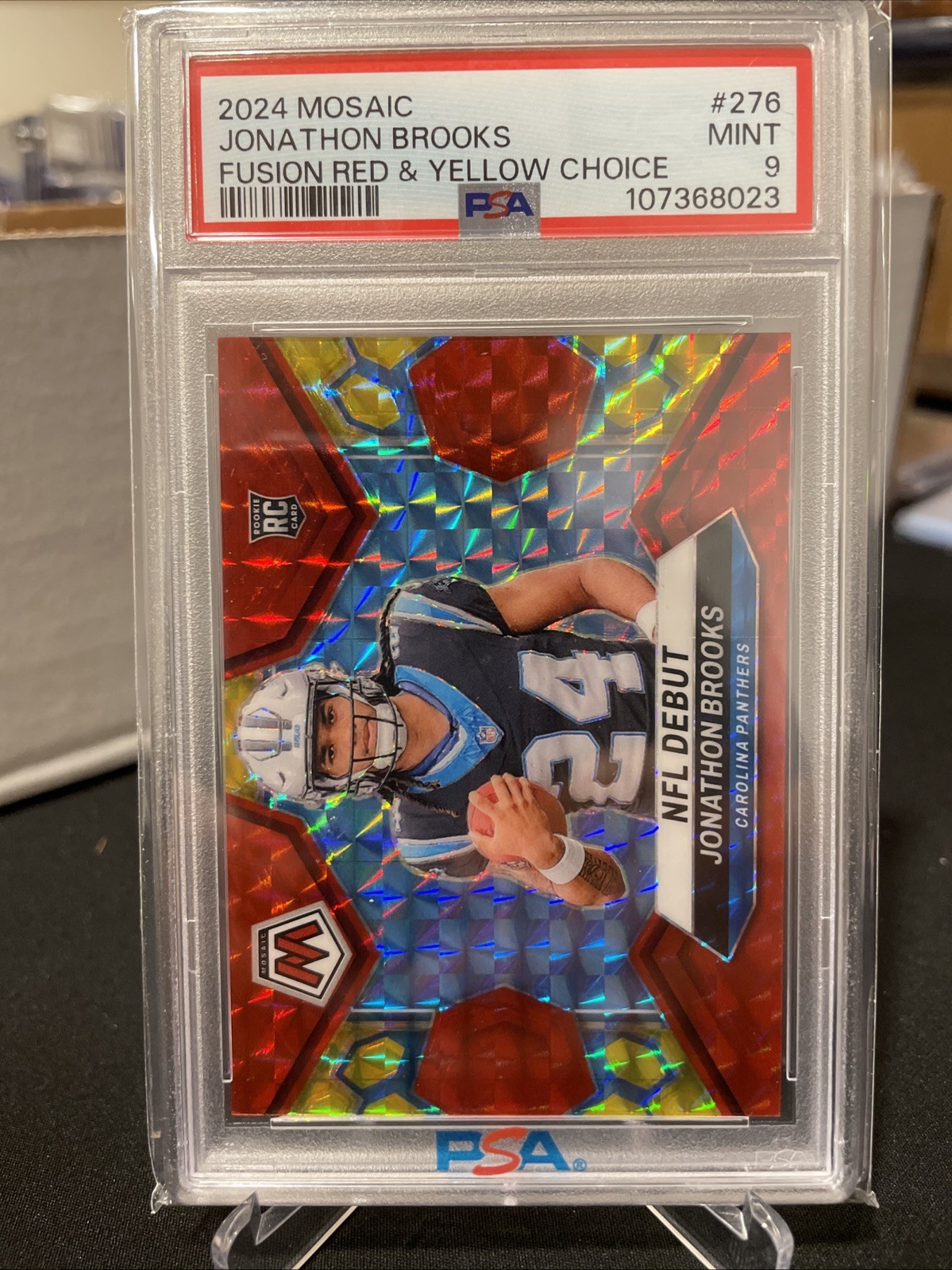 2024 Mosaic Jonathon Brooks Choice Fusion Red & Yellow Prizm RC NFL Debut 25/80