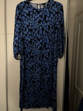 Woman’s Maxi Dress With Long Sleeves