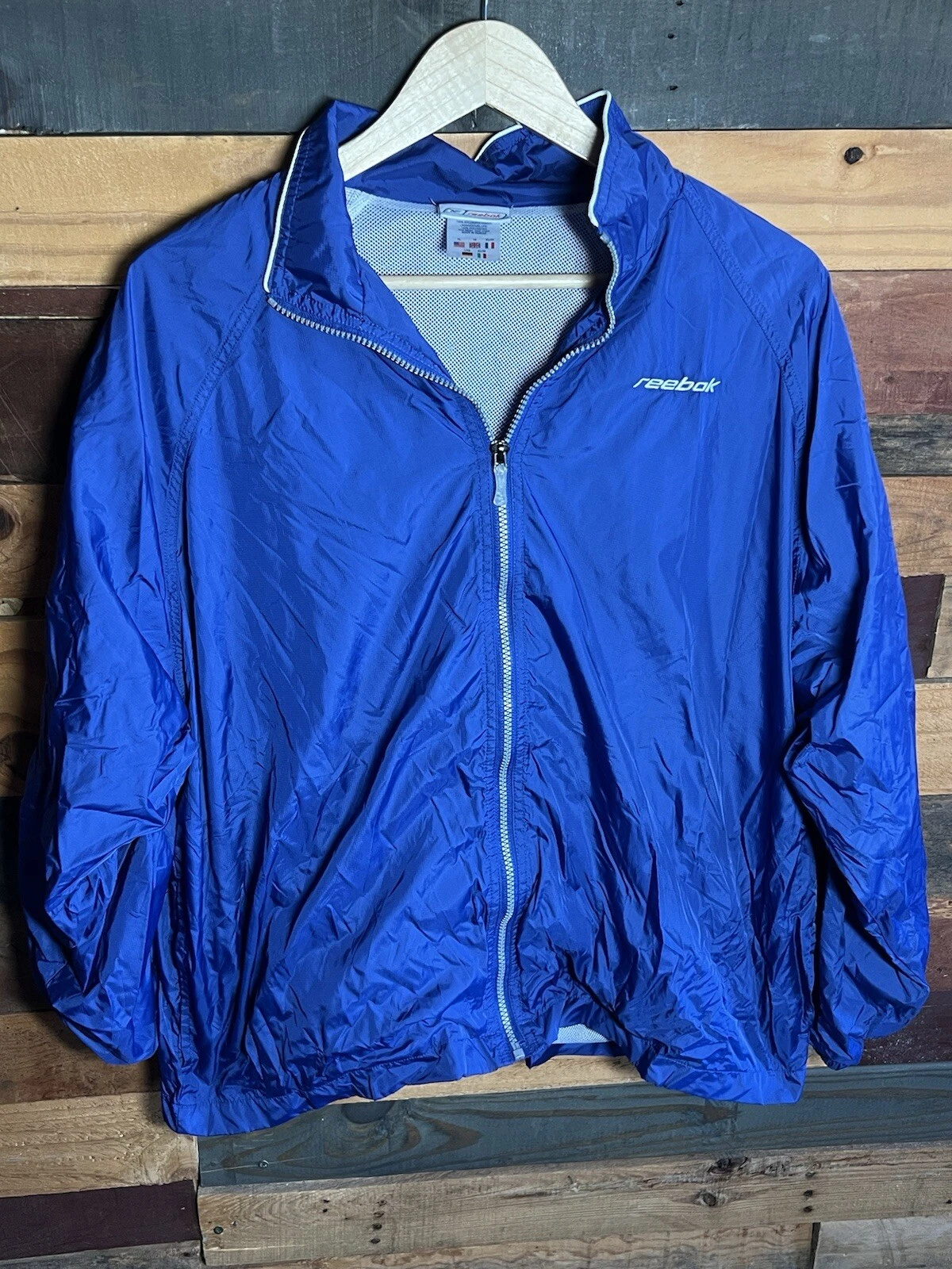 Vintage Reebok Retro Blue Colored Windbreaker Jacket Coat Reebok Tags Size XL