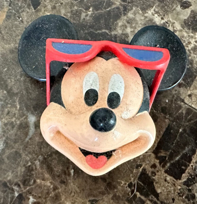 Mickey top wearing sunglasses