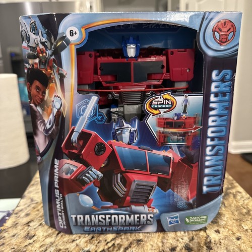 TRANSFORMERS EARTHSPARK SPIN CHANGER 8 INCH OPTIMUS PRIME AND 2 INCH ROBB MALTO - Picture 2 of 3