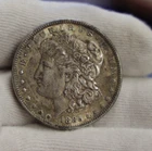 1885 US Morgan Silver Dollar $1 XF+ (Cleaned, Retoned)