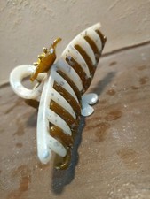 With Every Hair Clip In Golden And White Colors Beautiful
