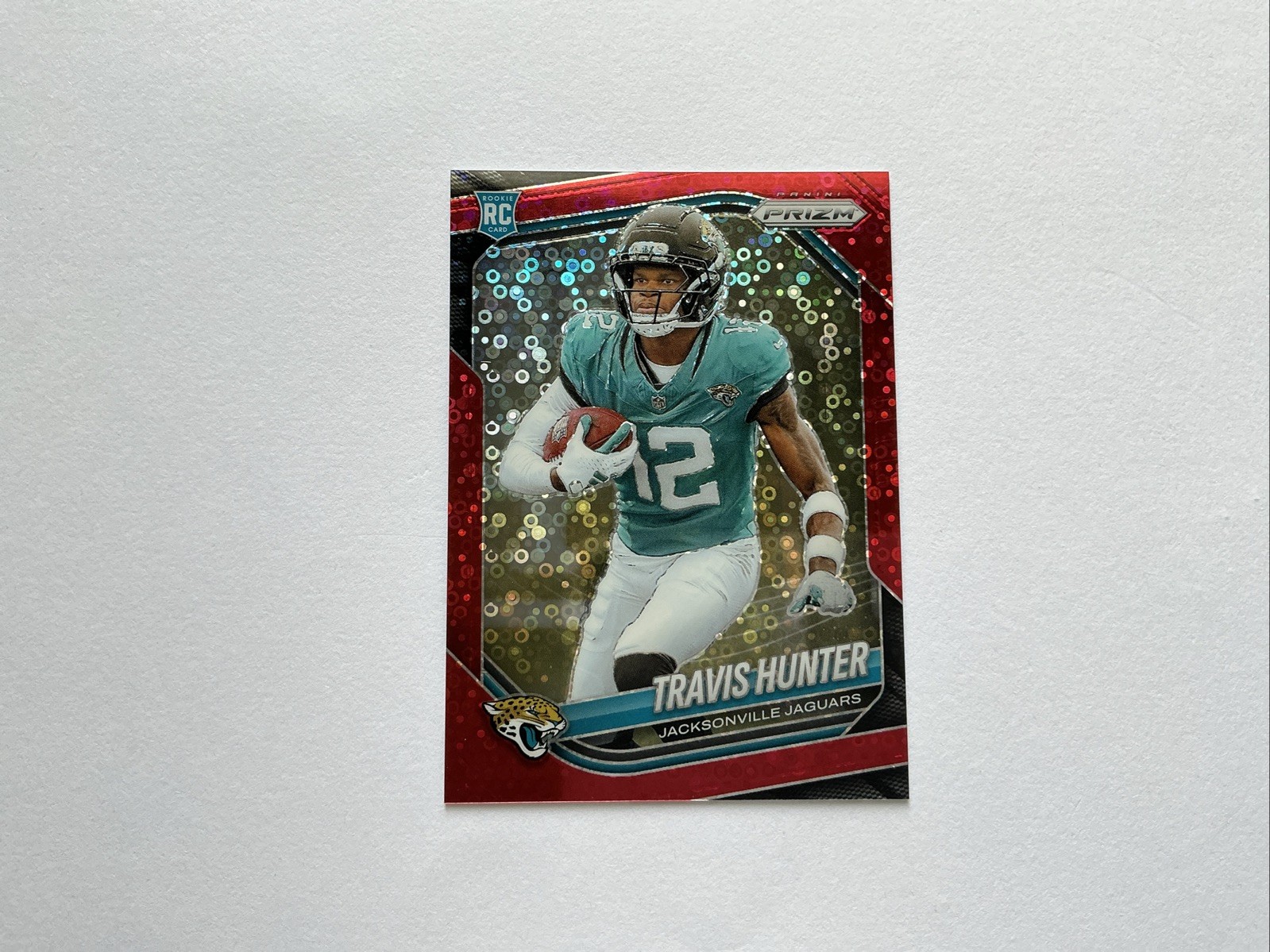 2025 Prizm Travis Hunter 62/99 Red Disco Prizm #301 Jaguars