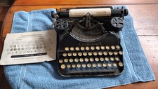 Corona typewriter 20s to 30s No case. works.needs cleaned Needs new ribbon. thumbnail