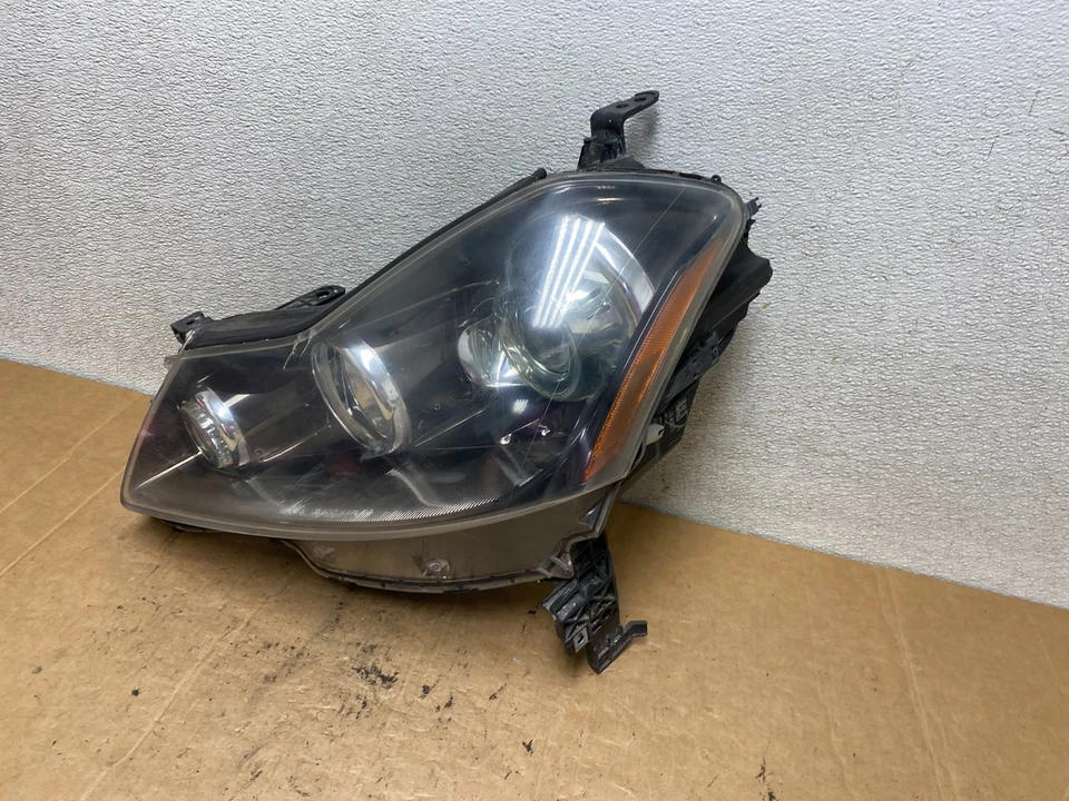 Faro de xenón oculto del lado izquierdo Infiniti M35 2006 a 2010 OEM T3140 DW Foto 2 de 4