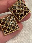 a mesh design. Brown tones.1 inch cuff links. Gold tone. Enamel in