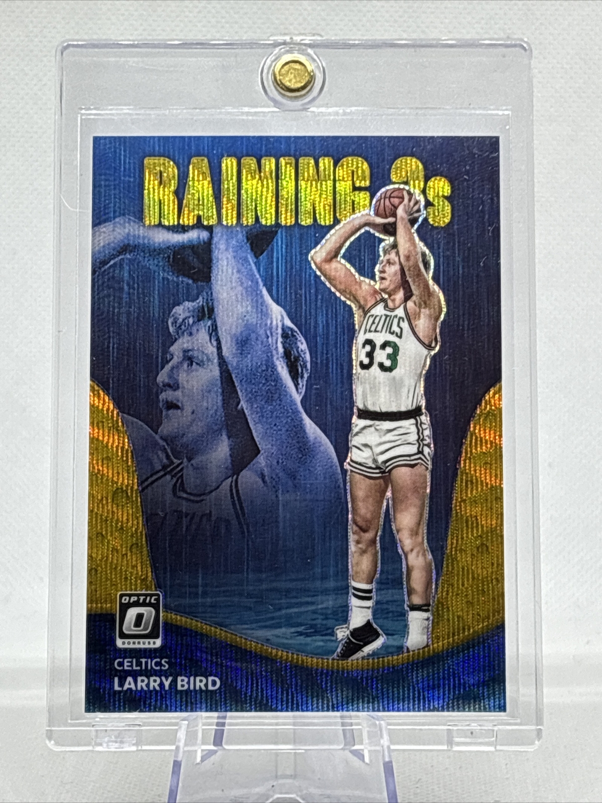 2022-23 Donruss Optic Raining 3s Larry Bird /10 Gold Wave Prizm #18 Insert NM+