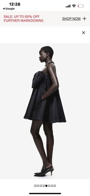 H&M. Sz S. Limited Edition Dress With Bow in front satin mini Black