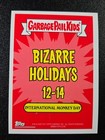 Greaser Greg Chris Hiss Spoof Mechanic Cal Monkey Day Bizarre Holiday card with red and orange cartoon background.