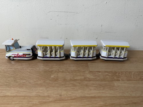 DISNEY PARKS 4 PIECE TRANSPORT TRAM SHUTTLE TROLLEY DIE-CAST SET w/ RUBBER TIRES