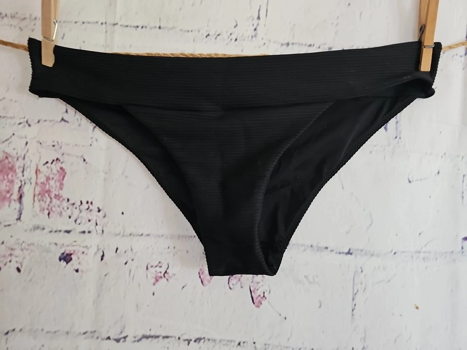 Parte inferior de bikini hipster de punto elástico acanalado negro talla 10 totalmente forrada de H&M Foto 3 de 4