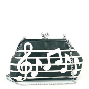 white clutch bag with silver chain