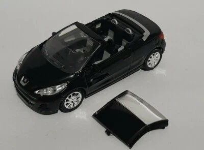 Norev 3 inches 1/60. Peugeot 207cc mk2 Roland Garros black. New in Box