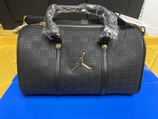 Nike Air Jordan Jumpman Monogram Mini Duffle Bag 3L Black Gold