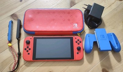 Nintendo Switch red/blue Edition mit Docking Station + 64 GB Speicherkarte   