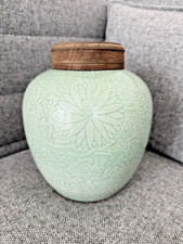 A Chinese Celadon Glazed Jar with Wood Cover, Late Qing Period