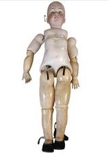 ANTIQUE WALKING DOLL. POSSIBLY JUMEAU. BISCUIT. FRANCE (?). 19TH-20TH CENTURIES