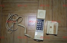 Push-button landline telephone