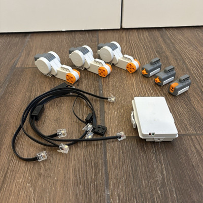 LEGO Mindstorms NXT 9797 Lot 3 Servo Motors, 3 Sensors, 5 Cables, and a Battery!